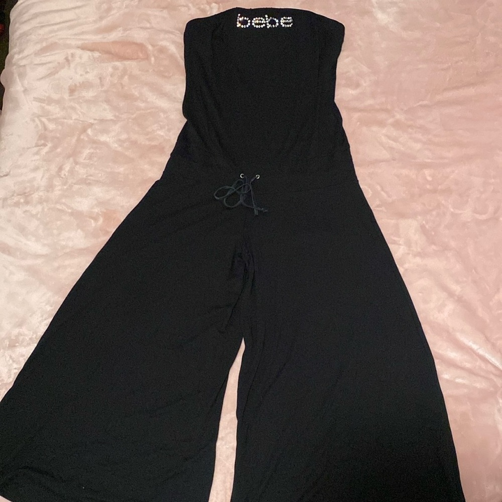 Bebe leg stretch jumper size L strapless